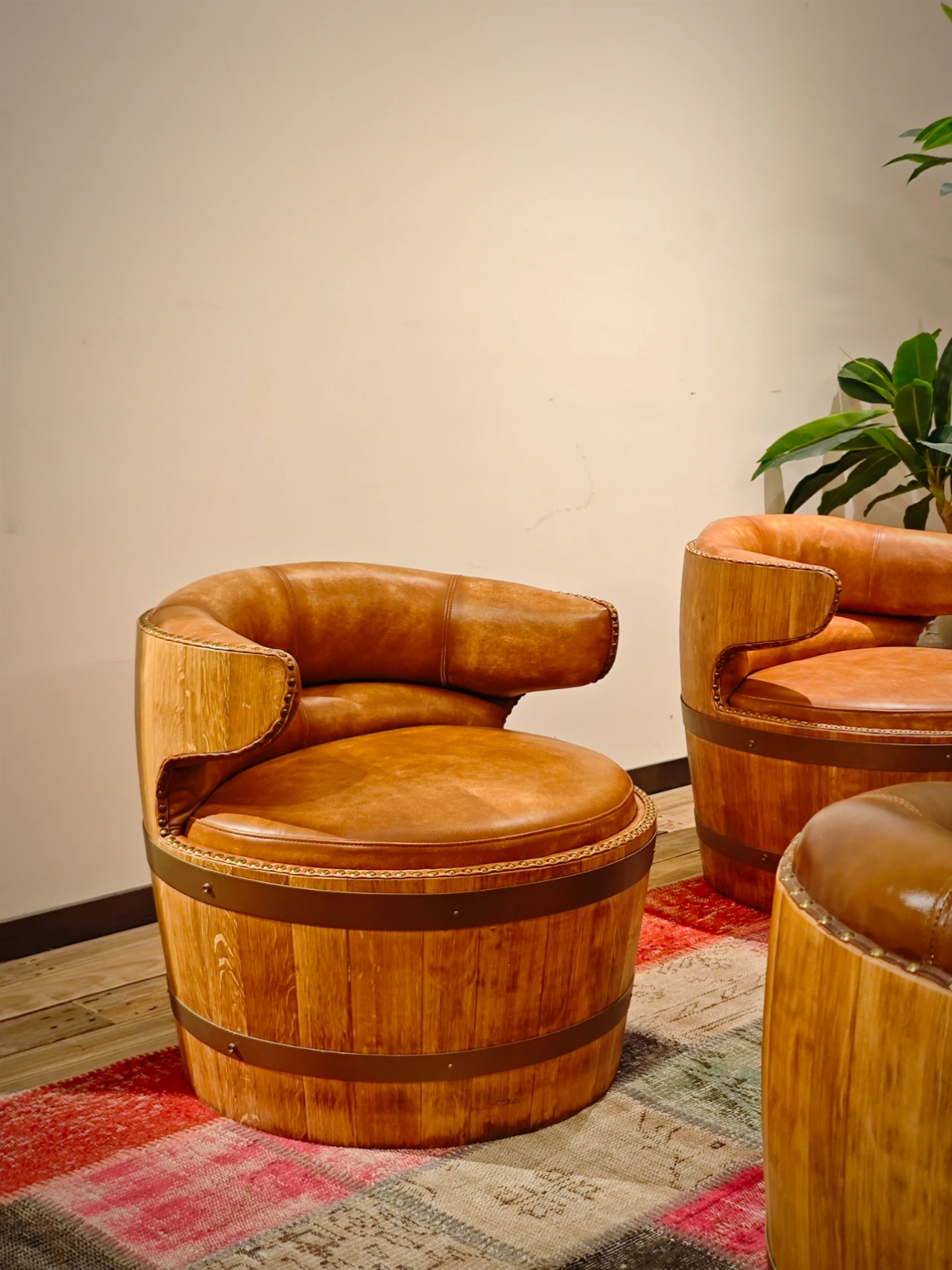 Unique Rustic Barrel Shape Leather Single Lounge Chair with Hand Crafted Wooden Base
