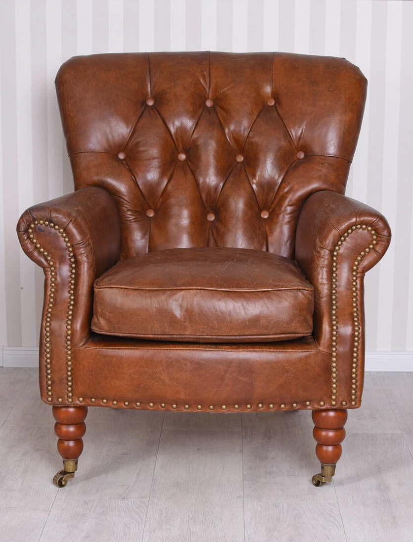 Vintage Brown Tufted Back Leather Armchair with Nailhead Accents and Casters