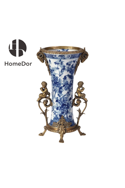 Decorative vase with blue floral design and gold accents on a white background, featuring the HomeDor brand.