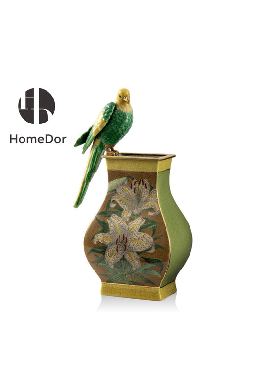 Decorative vase with floral design and a parrot perched on top, brand 'HomeDor' visible.