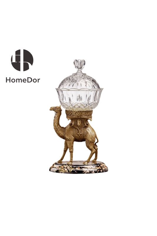 Decorative camel statue with a glass container on a white background, featuring the HomeDor brand.