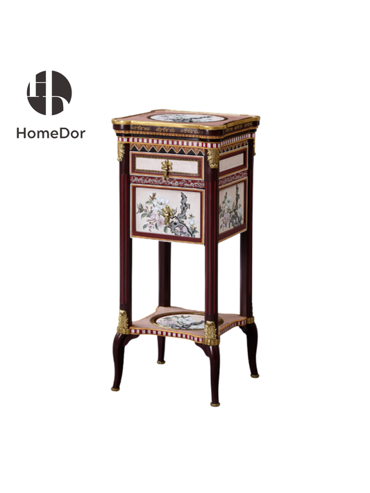 HomeDor HomeDor × FH&Home | French Orchid Porcelain Pedestal Table-L47cm x W47cm x H108cm It combines the classic allure of a wooden structure with the delicate charm of copper accents and the artistry of high-temperature porcelain featuring French orchid motifs, resulting in a piece that radiates timeless elegance and sophisticated artistry.