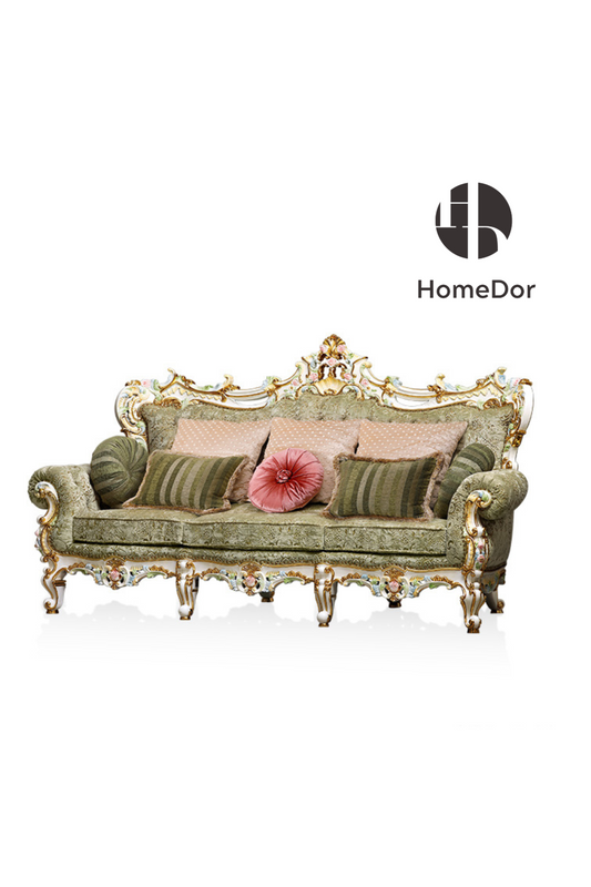 Homedor Decorative sofa with ornate gold frame and pink cushions on a white background