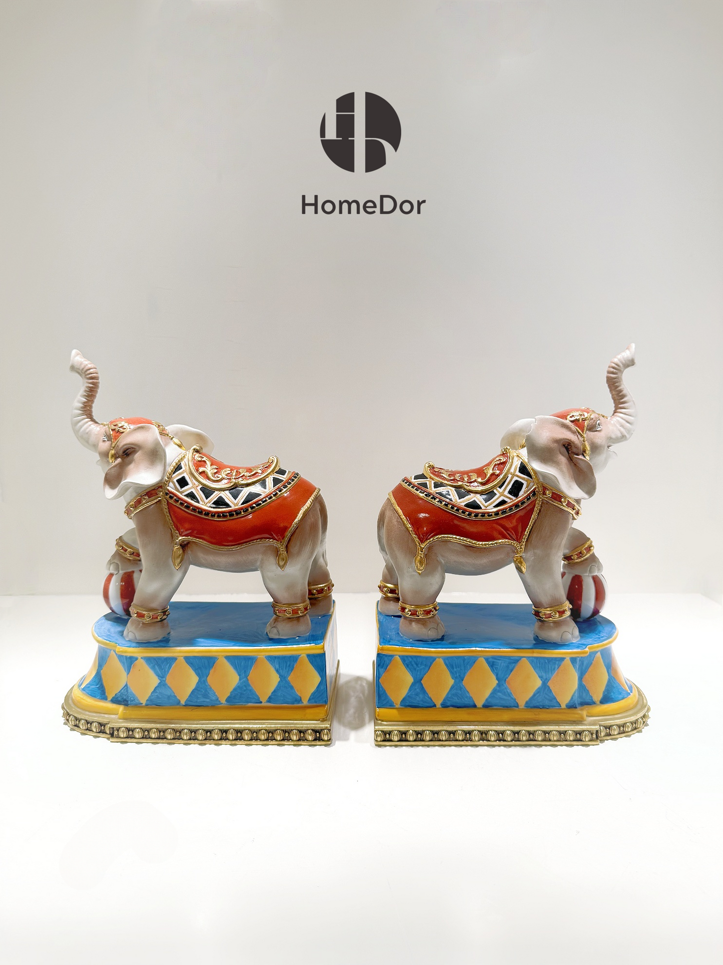Vibrant Painted Ceramic Playful Elephant Bookends 1