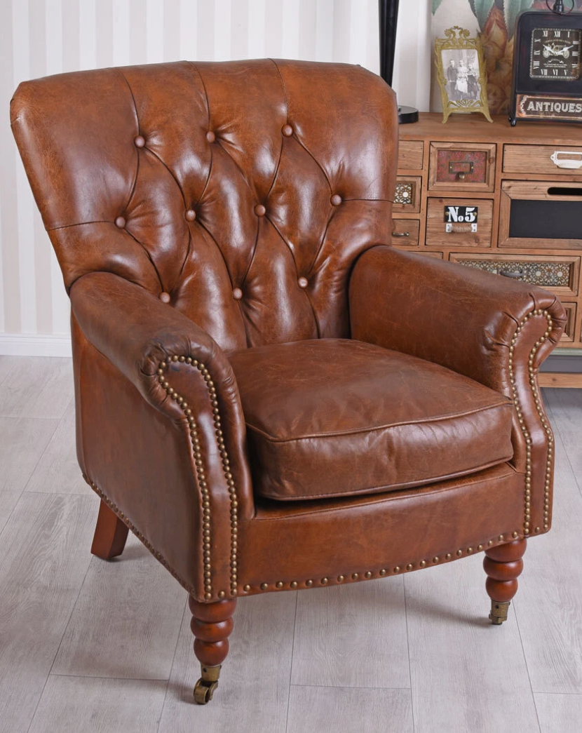 Vintage Brown Tufted Back Leather Armchair with Nailhead Accents and Casters