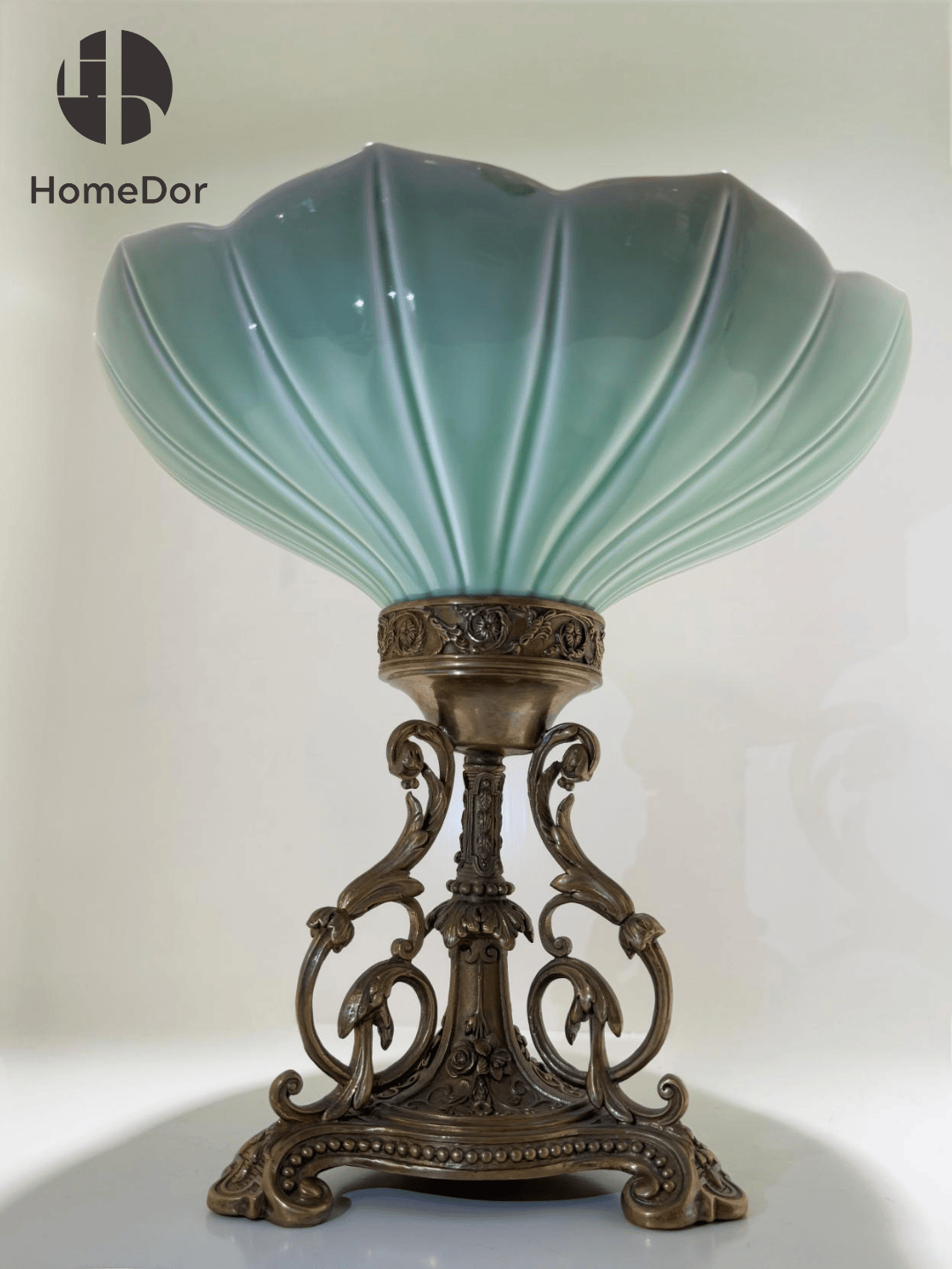 Artistic Celadon Porcelain Decorative Compote with Distinctive Ornate Brass Base
2