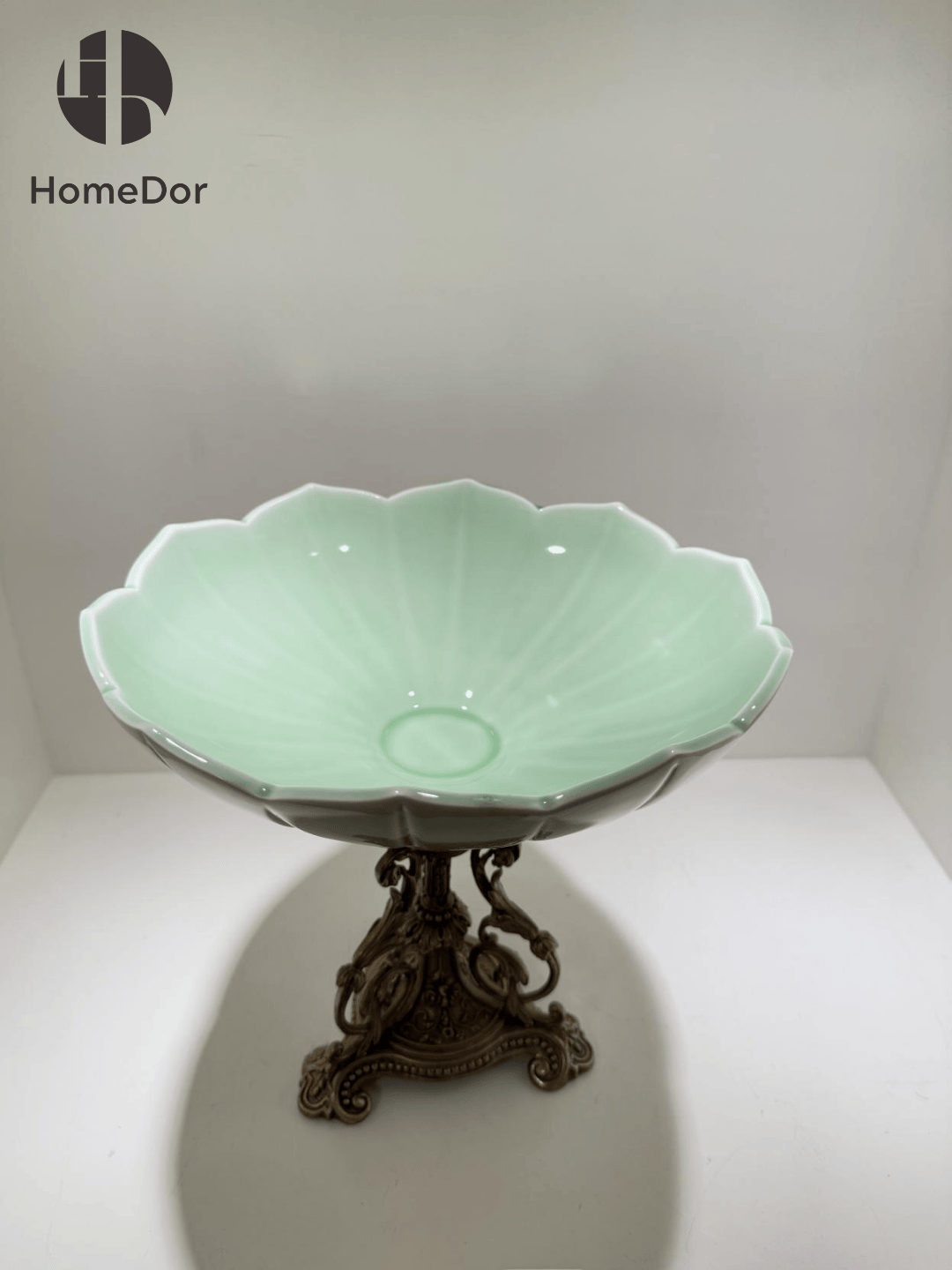 Artistic Celadon Porcelain Decorative Compote with Distinctive Ornate Brass Base
3