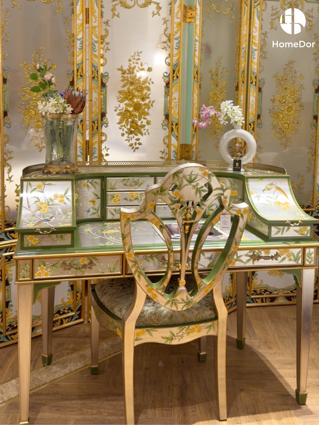 Adorned with silver and gold hand-painted floral and bird motifs