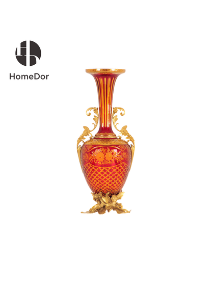 Comprising a monumental amphora, a decorative amphora, and a grand ceremonial tazza, the ensemble showcases the extraordinary artistry of Aurora Glass through a radiant palette of amber, ruby, and sunlit gold. Delicate floral etching, intricate gilt mounts, and luminous color transitions create a remarkable interplay of light and ornament, transforming each piece into a jewel-like statement of decorative art.
