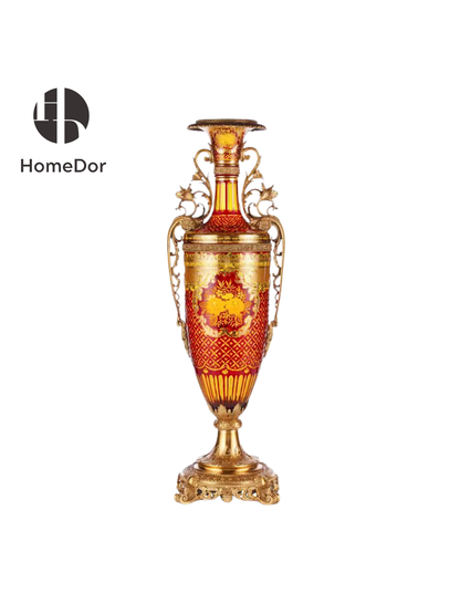Inspired by the grandeur of Belle Époque interiors and the opulence of imperial collections, the ensemble combines architectural scale with refined craftsmanship. The towering amphora rises as a monumental focal point, while the companion pieces echo its richness through elegant proportions and intricate detailing.