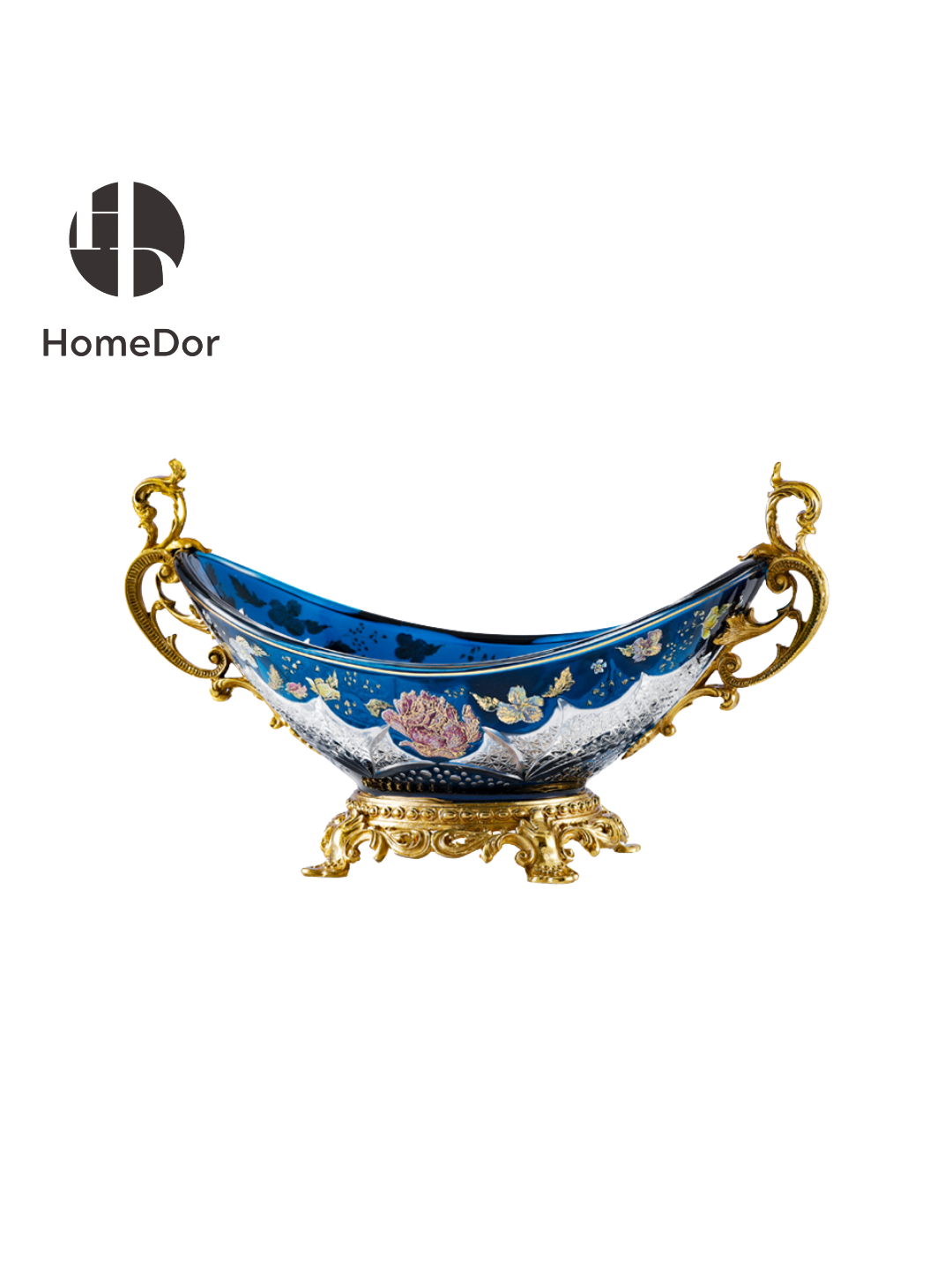 Inspired by the romance of Belle Époque decorative arts, each piece combines luminous Aurora Glass with intricate gilt mounts, creating a harmonious balance between elegance and imagination. The rich blue palette evokes twilight skies, while the golden floral motifs bring warmth and vitality, as though illuminated by a hidden moonlit glow.