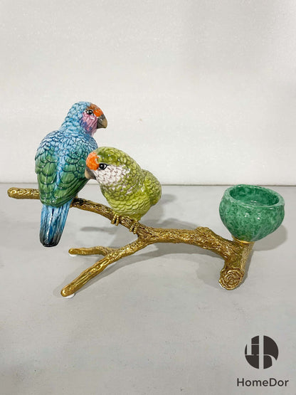 Candelabro con pájaros verdes y dorados en una rama HomeDor