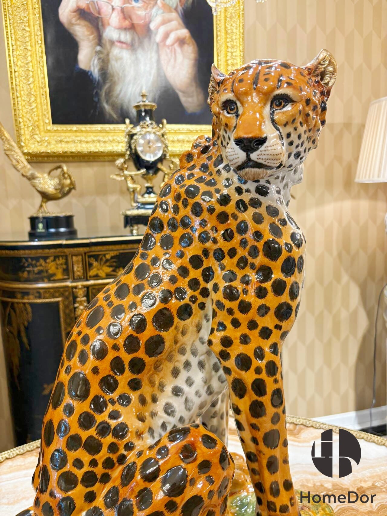 Each sculpture is rendered in hand-painted porcelain with naturalistic detail, the amber and black of the coat built up with the patience of the Animalier tradition, the 19th-century European school of sculptors and ceramicists who believed that wild animals deserved the same artistic attention as any human subject. 