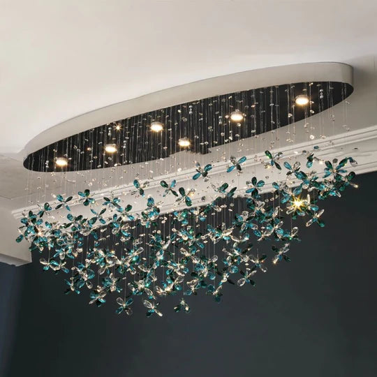 Lampadario in cristallo con fiori di giglio verde acqua