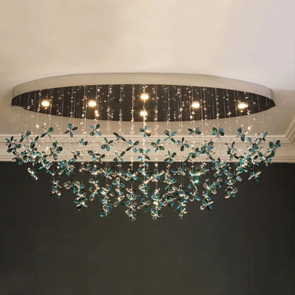 Lampadario in cristallo con fiori di giglio verde acqua