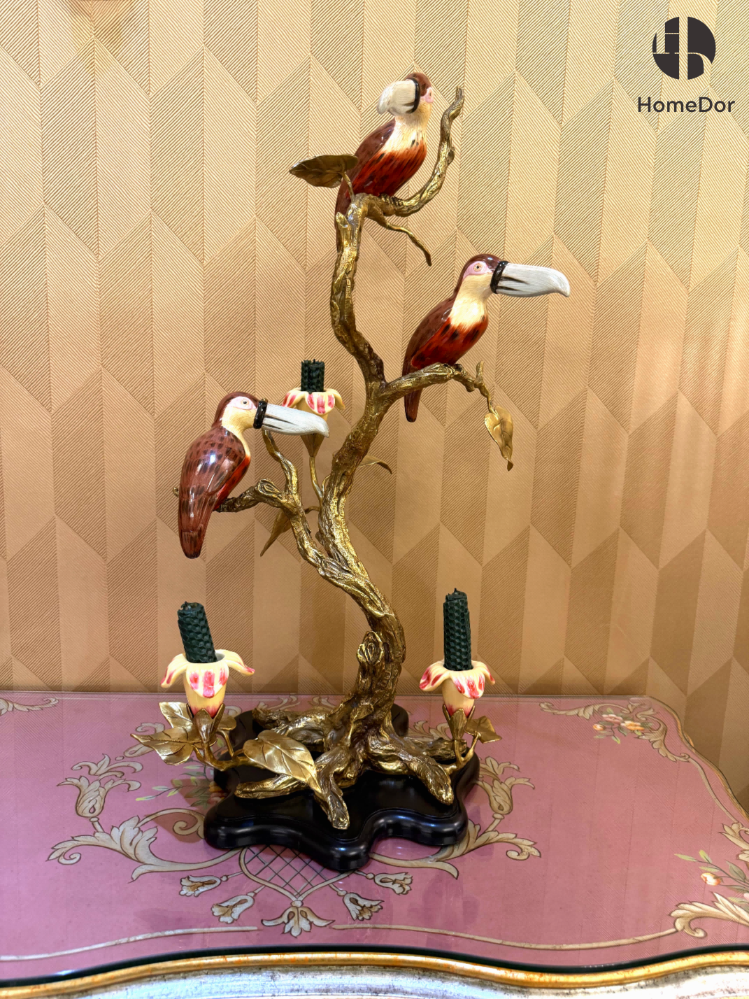 Decorative figurine featuring nature-inspired carving and brass finish.