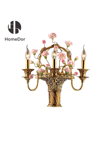 This beautiful pink floral brass wall sconce is rooted in New Spanish aesthetic influences, it acts as both a functional light source and a decorative focal point. Perfect for spaces leaning into rustic romance, classic vintage, or Mediterranean-inspired styles, this sconce turns empty walls into captivating, inviting features.