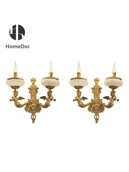 This light fixtures are adorned with elegant high-temperature porcelain shades, casting a soft, diffused glow, while the gleaming gold finish adds a touch of timeless grandeur. 