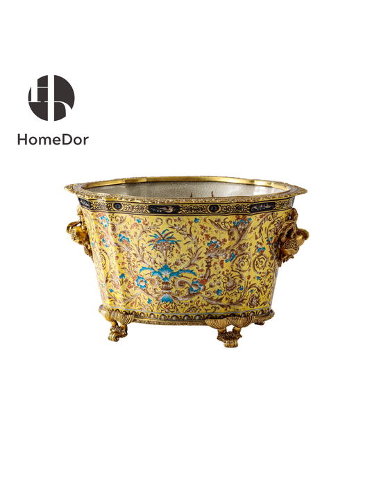 The Imperial Arabesque Chinoiserie Garniture celebrates the rich dialogue between cultures that shaped the decorative arts of the 18th and 19th centuries.

Comprising a stately baluster vase, an elegant faceted palace vase, and a coordinating jardinière, the ensemble is adorned with an intricate tapestry of scrolling arabesques, flourishing botanical motifs, and jewel-like accents. The flowing ornament recalls the floral traditions of Persia and the Ottoman world, while the porcelain forms draw inspiration 