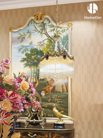 a chic fixture that blends polished gilded brass framing with cascading crystal fringes. Designed in a retro-inspired aesthetic, its ornate structure pairs with dangling crystal tassels that catch light to cast a soft, luminous glow, making it a standout focal piece for any space.
Perfect for elevating entryways, dining rooms, or bedroom ceilings, this chandelier marries timeless retro charm with luxurious detailing, adding a touch of refined elegance to your interiors.