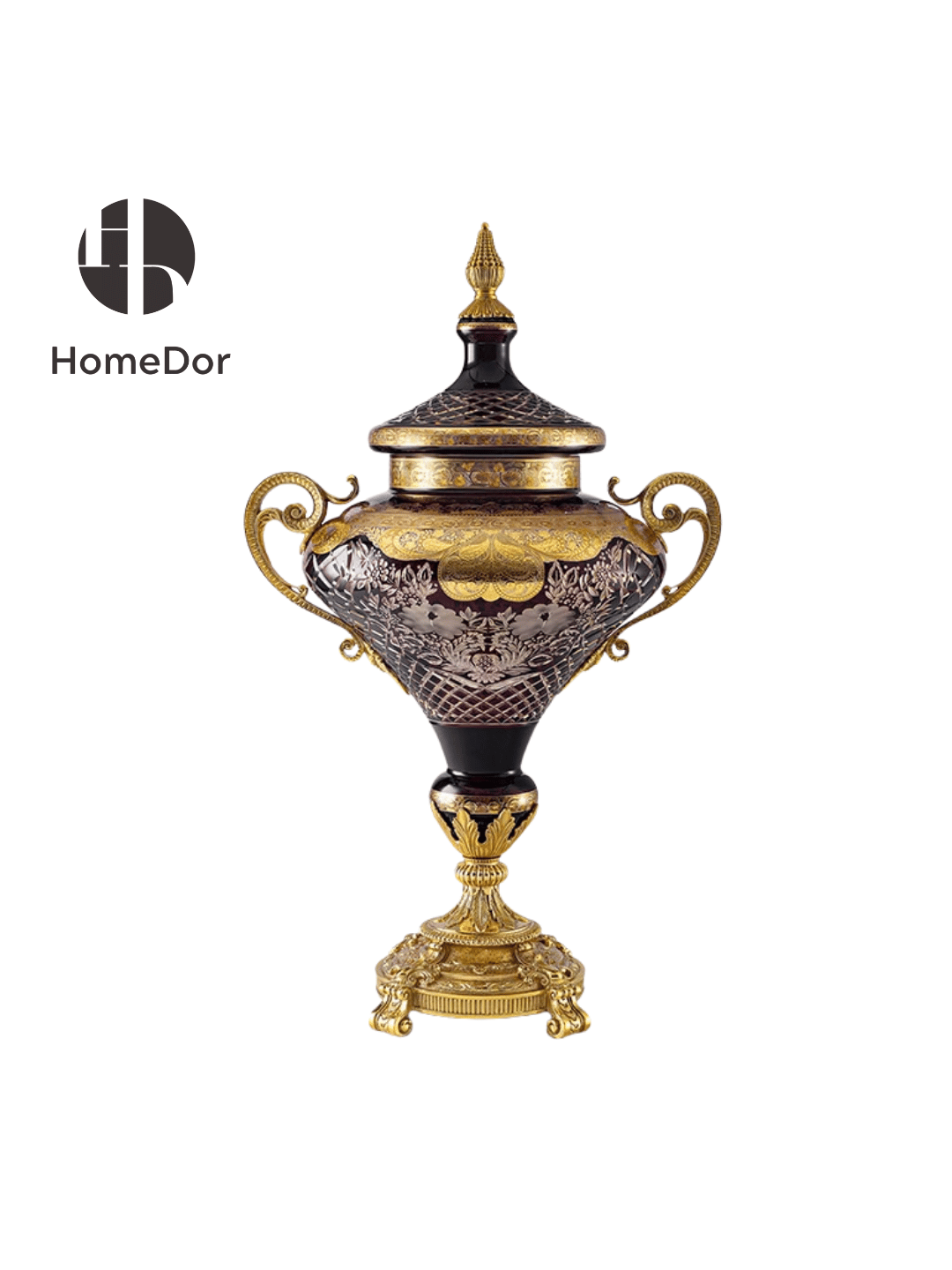 The smaller urn is taller in proportion and more slender in line, its body tapering toward a pedestal mounted in acanthus leaves and a gilt base on scrolled feet. Made for a mantel, a console beneath a mirror, or a pedestal in an entrance hall, it brings the same drama to a more intimate scale.