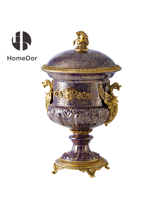 Inspired by the imperial allure of porphyry stone, the ensemble transforms porcelain into a vision of carved amethyst and gilded bronze.