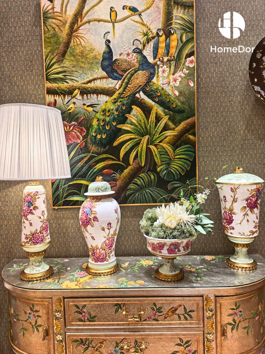 Soft ivory grounds carry the roses in warm, painterly detail, while quiet touches of pale green appear at the base and interior of each piece, like the hush of leaves just beneath the flowers.