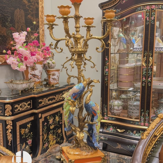Artistic Ceramics Peacock Brass Candle Holder featuring brass carving and European palace style details. Perfect for luxury home decor, classical living rooms, and villa interiors.
