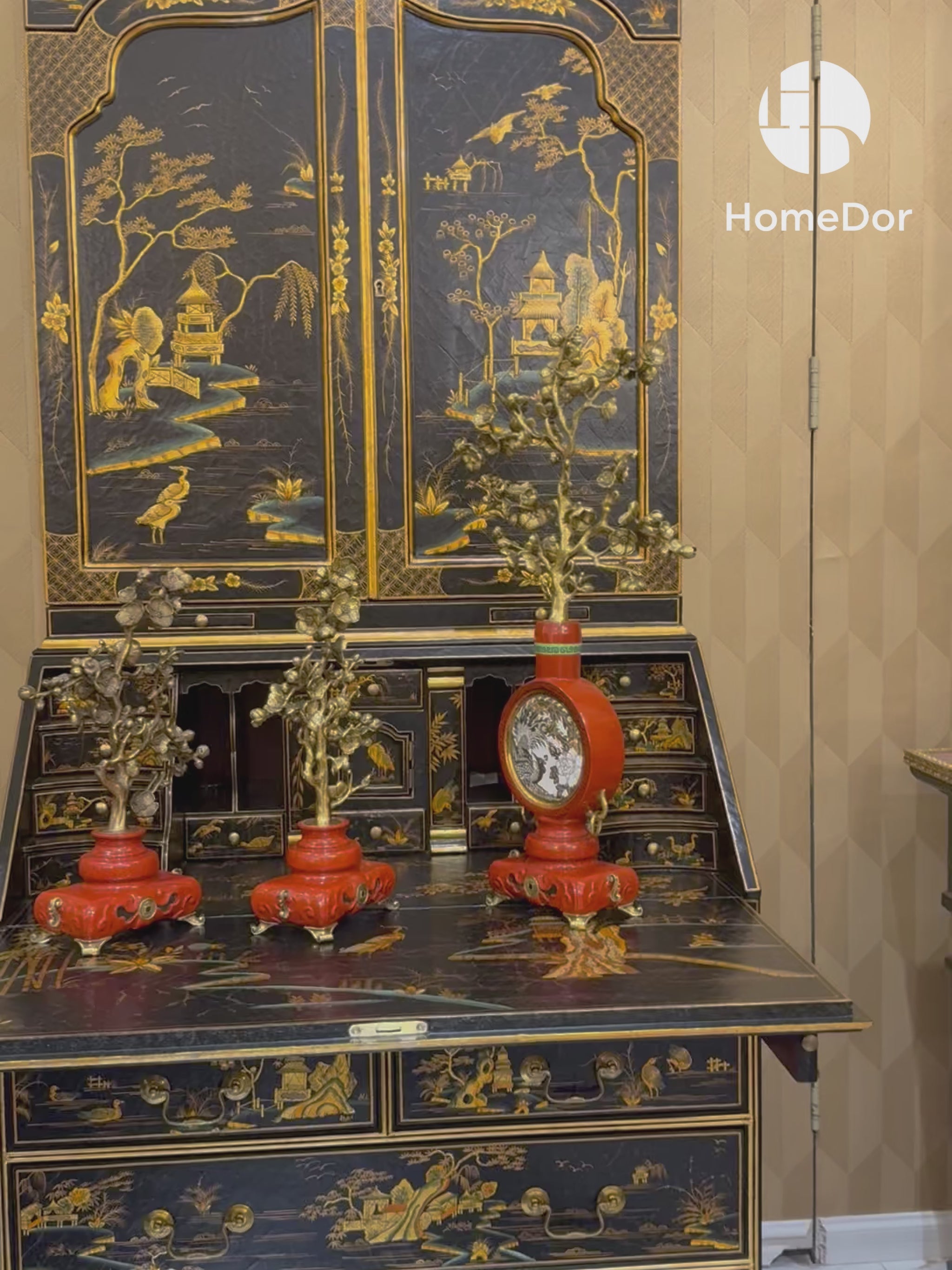 This Exquisite Black Lacquer Secretary Bookcase with Gold Oriental Scenes is a captivating and refined addition to the HomeDor collection. It combines the classic allure of a birch wood structure, the unique texture of carbonized poplar panels, the versatility of MDF, and the delicate charm of resin accessories, all brought to life with luxurious gold-oriental scenes on a black lacquer finish, resulting in a piece that radiates timeless elegance and sophisticated artistry.