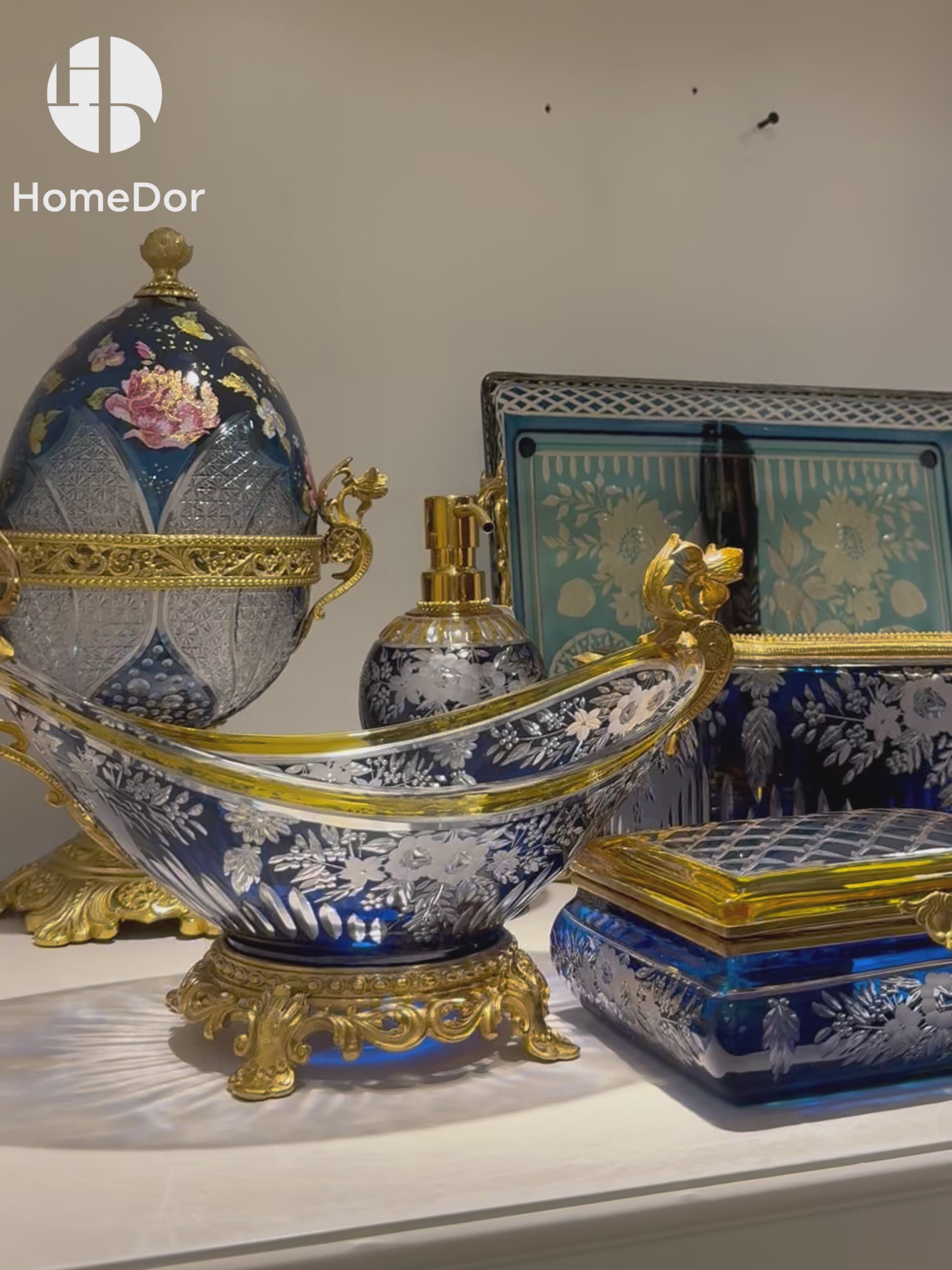 Handcrafted Aurora Glass Cobalt Blue & Sapphire Blue Etched Floral Set featuring brass carving and European Palace style detials. Perfect for luxury home decor, classical foyer, and villa interiors