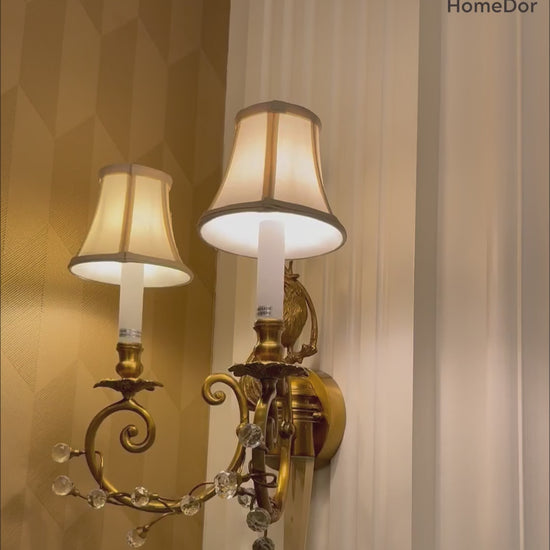 mounted beside a bed, above a console, or along a dining room wall