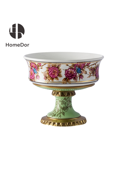 Porcelain compote bowl with hand painted pink roses and blue butterflies on fluted gold pedestal