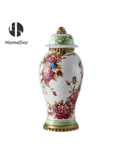 Porcelain lidded vase with pink roses, blue butterflies, and pale green lid