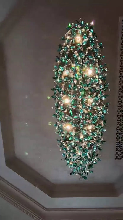Lampadario in cristallo con fiori di giglio verde acqua