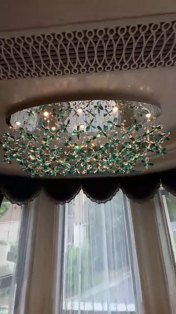Lampadario in cristallo con fiori di giglio verde acqua