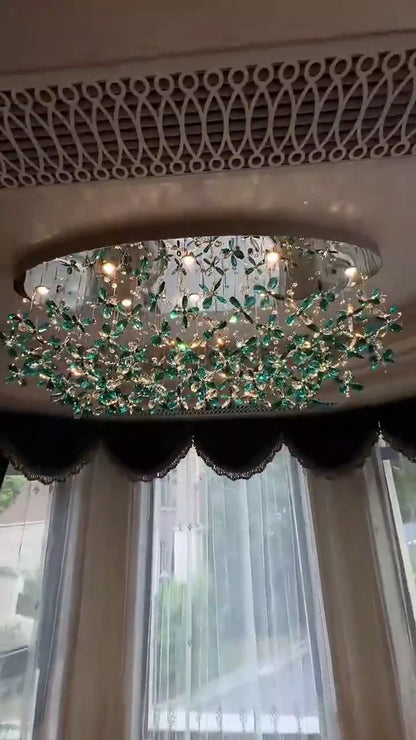 Lampadario in cristallo con fiori di giglio verde acqua